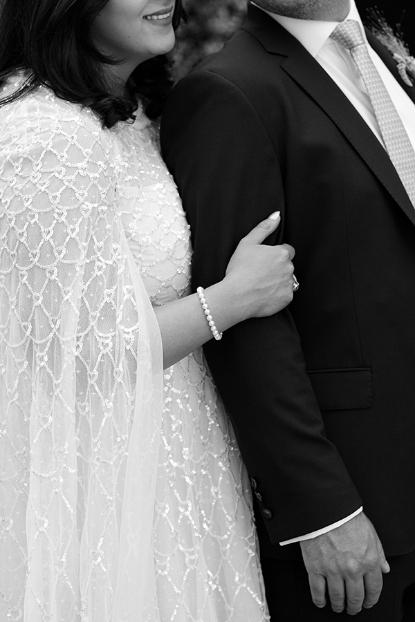 close up shot of hands in black and white
